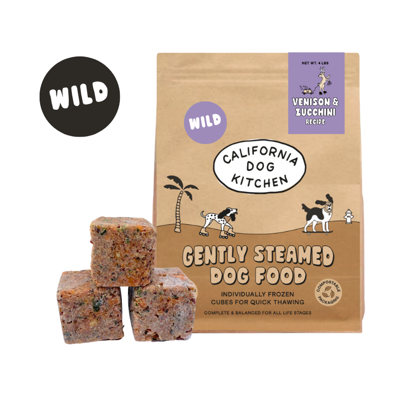 Gently cooked venison and zucchini dog food in frozen cubes from California Dog Kitchen, featuring organic ingredients.